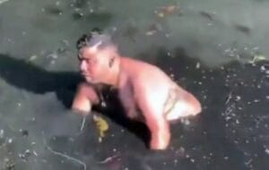 Manauara pula em esgoto para resgatar celular e ‘pescaria’ dura 3 horas