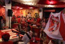 Secom Galera vermelha e branca Arthur Castro